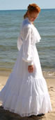 Edwardian lady in white cotton batiste gown at the seashore