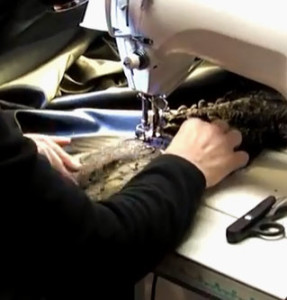 Seamstress working at sewing machine