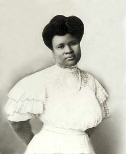 Madam CJ Walker in white dress