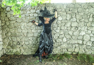 Halloween 2018 Caption This! Photo Contest - witch at the wall