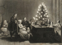 Martin Luther shown with his family beside a candle-lit tree