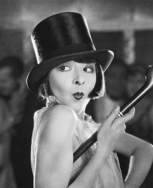 Colleen Moore 'flapping' it up in top hat and cane